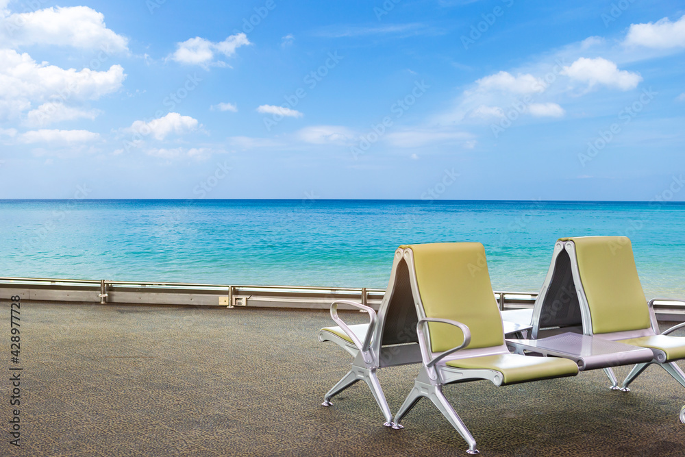 Airport chair at waiting area with beautiful beach view, holiday destination, summer vacation Airport chair at waiting area with beautiful beach view, holiday destination, summer vacation