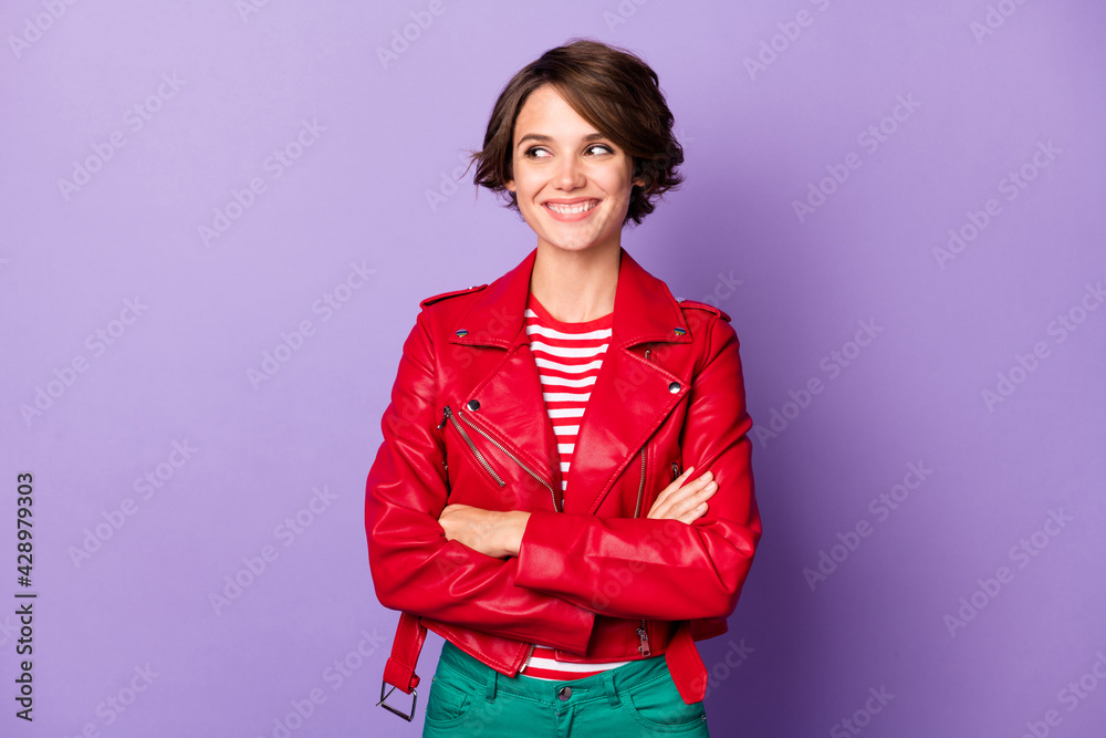 Photo of young attractive woman happy positive smile folded hands dream dreamy look empty space isolated over violet color background Photo of young attractive woman happy positive smile folded hands dream dreamy look empty space isolated over violet color background