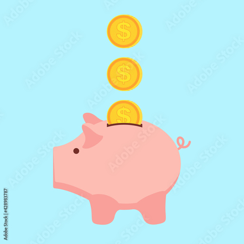 Falling coins in a pink piggy bank in the form of a pig.  Money accumulation concept.  Background for business and finance.