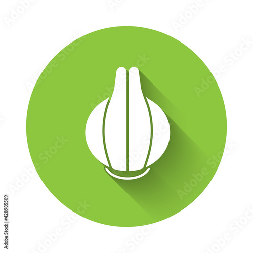 White Onion icon isolated with long shadow. Green circle button. Vector
