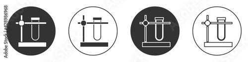 Black Glass test tube flask on stand icon isolated on white background. Laboratory equipment. Circle button. Vector