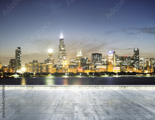 Empty dirty concrete embankment on the background of beautiful Chicago skyline at twilight, mockup