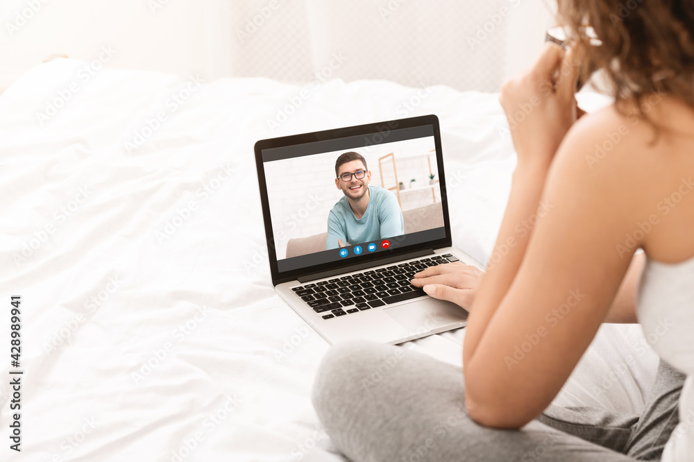 Fototapeta premium Remote Communication. Unrecognizable Lady Making Video Call On Laptop To Her Boyfriend