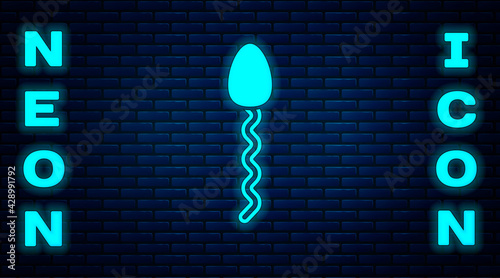 Glowing neon Sperm icon isolated on brick wall background. Vector
