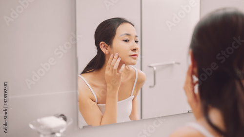 Woman taking care of her skin