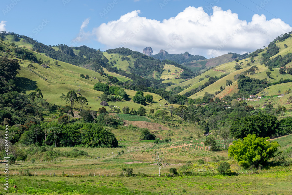 valley landscape in the mantiquira mountain with a view of Pedra do Bau
