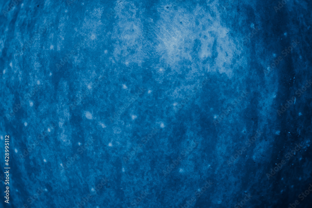 blue apple skin with visible details. background