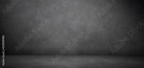 Concrete room and floor in the dark background, gray textured banner with copy space for product display or mock up présentation 
