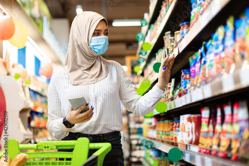 Islamic Lady In Hijab Buying Food Doing Shopping In Store