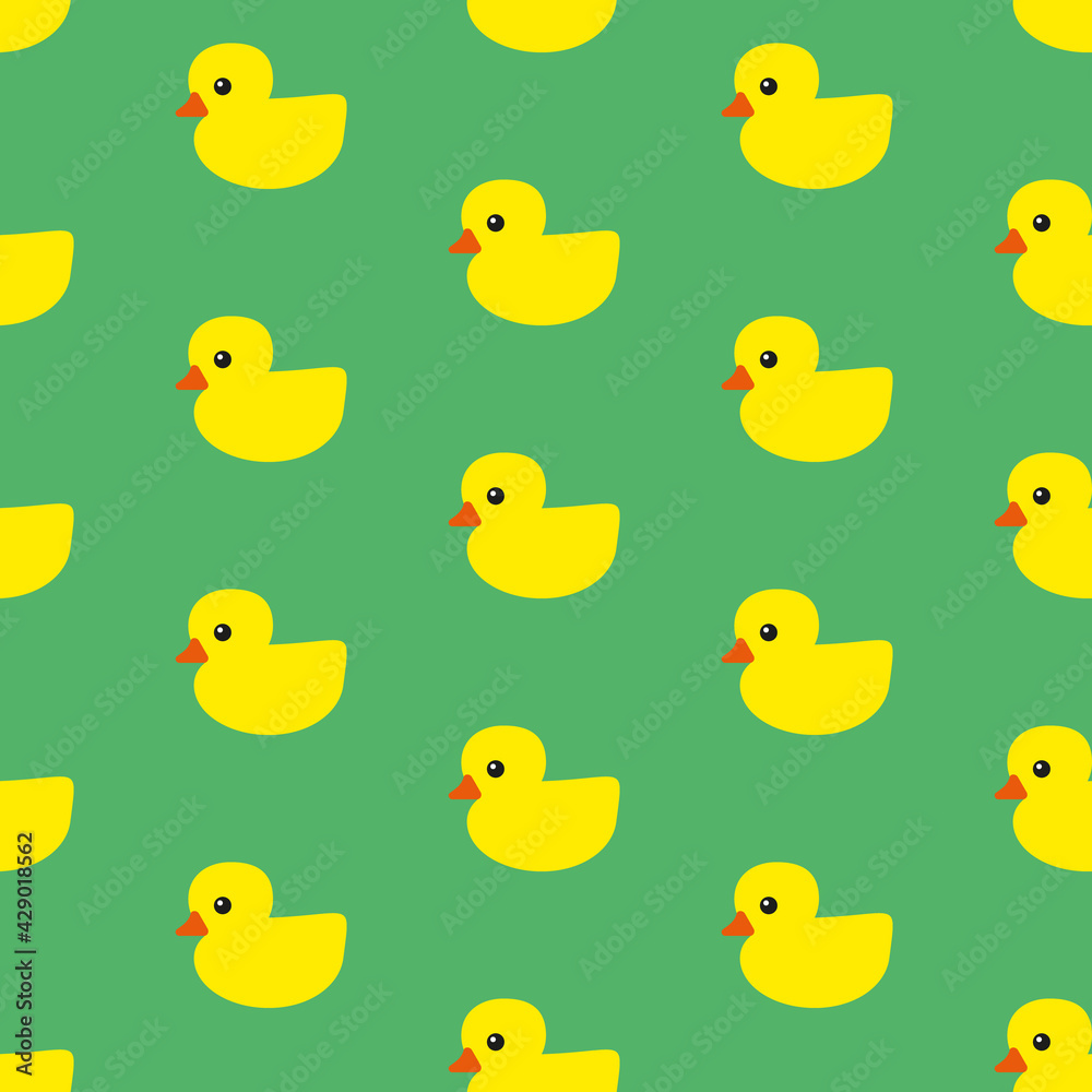 Yellow rubber ducks with orange beaks and black eyes on green background, seamless pattern Yellow rubber ducks with orange beaks and black eyes on green background, seamless pattern