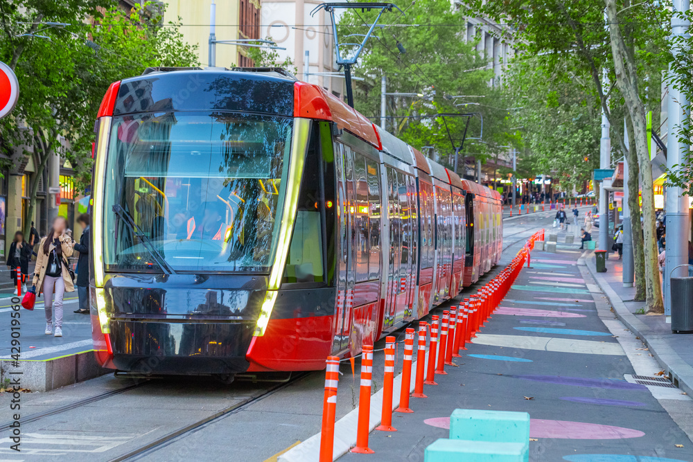 Naklejka premium Tram moving through George St in Sydney NSW Australia