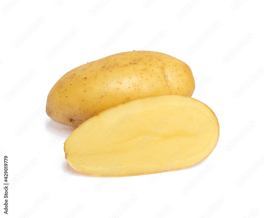 Raw potato and potato cut in half isolated on white background.