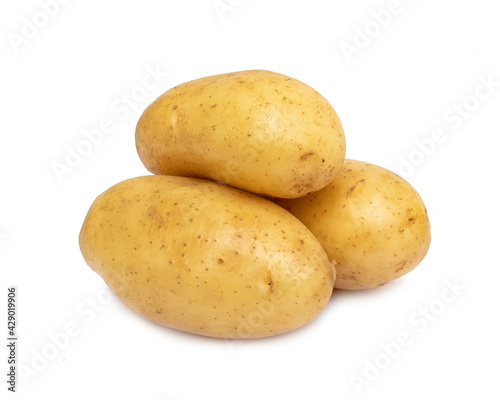 Pile of raw potatoes isolated on white background