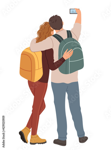 A couple in love is photographed in nature.Friends with backpacks went to nature.Selfs in the mountains.Travel with light luggage.