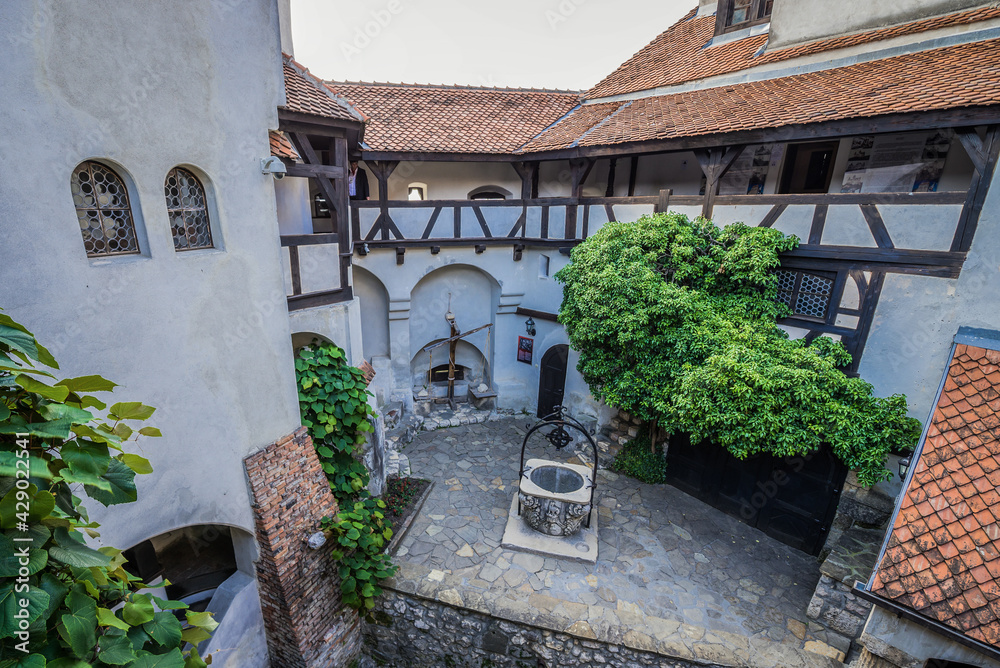 Well on a courtyard of Castle near Bran town, known as Castle of Dracula in Transilvania, Romania