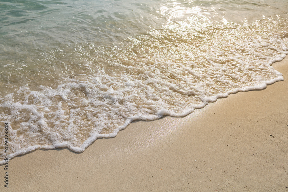 Beautiful Sunrise seascape on sandy beach