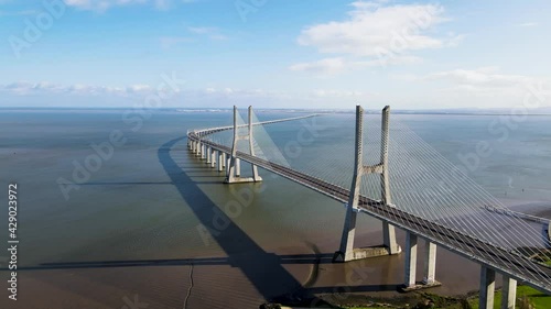 Aerial view of Vasco da Gama bridge over Tagus River in Lisbon city center, Lisbon, Portugal.