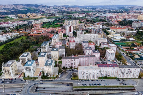 Aerial view of Benfica residential district at twilight, view of white building, Lisbon, Portugal.