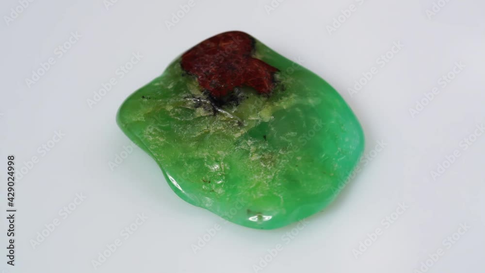 natural chrysoprase rough on the turning table