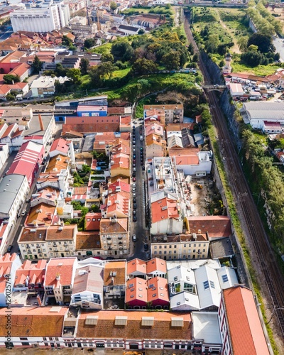 Aerial view of a small residential district in Lisbon outskirt along a railway, Marvila neighbourhood, Lisbon, Portugal.