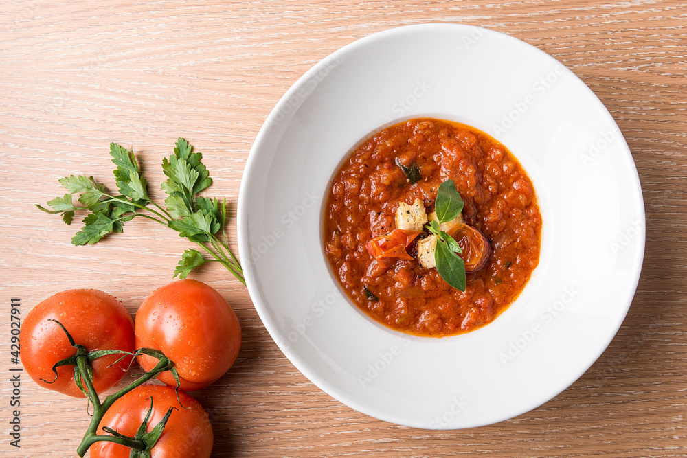 Italian Baked tomato gravy with toasted bread with beef tomato and salad Italian Baked tomato gravy with toasted bread with beef tomato and salad