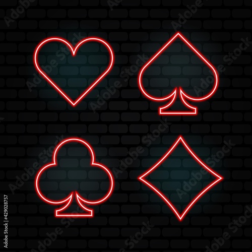 Casino neon card suits vector icons set. Isolated on black Background. Casino Emblems and Labels, Bright Neon Sign, Slot Machine, Roulette, Poker, Dice Game. Vector illustration