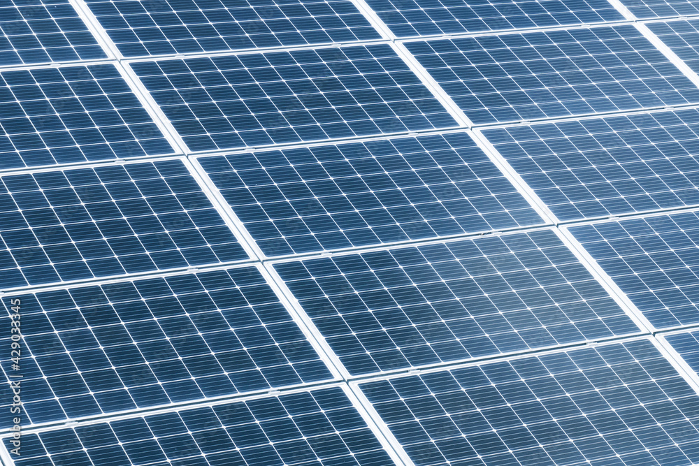 Solar panel texture. Environmental technology. Green eco power supply background. Electrical cell generating current. Renewable sources of energy. Photovoltaic panels pattern. Solar panel texture. Environmental technology. Green eco power supply background. Electrical cell generating current. Renewable sources of energy. Photovoltaic panels pattern.