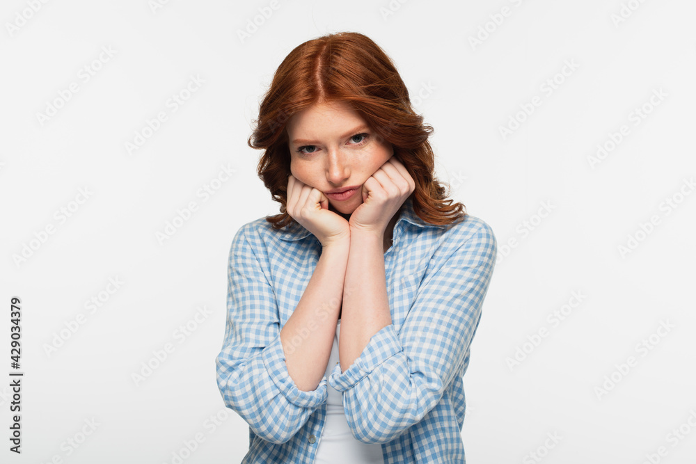 frustrated redhead woman in blue plaid shirt isolated on white. frustrated redhead woman in blue plaid shirt isolated on white.
