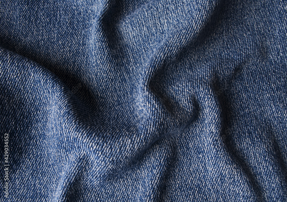 Macro Blue Folded Denim Backdrop, Cotton Jeans Textile Texture Closeup 