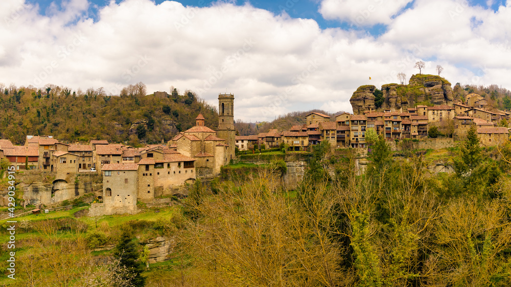 Panoramic view from Sta. Magdalena of the medieval town of Rupit that remains stepped on a cliff. Rupit. Catalonia, Spain