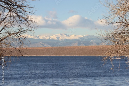 chatfield dam between lake and mountains  photo