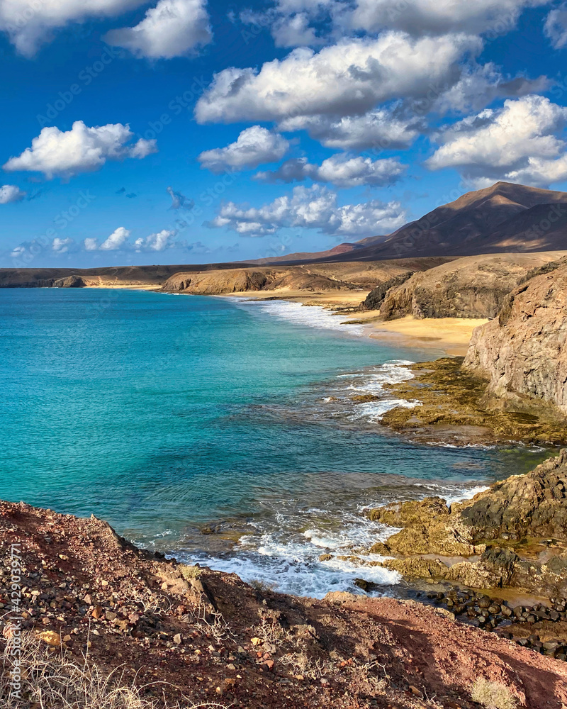 view of the coast of Lanzarote at the Punta de Papagayo in the Canary Islands, Spain