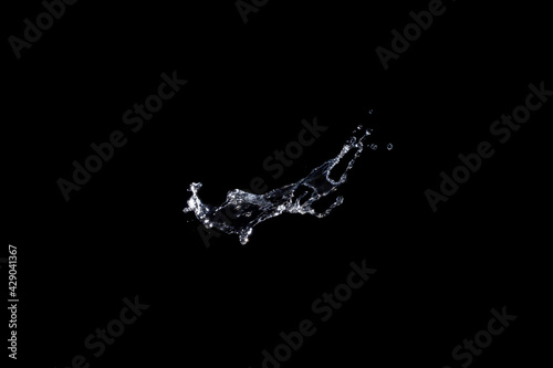 Fototapeta Naklejka Na Ścianę i Meble -  Water splash isolated on black background.