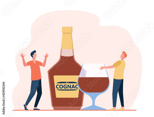 Two tiny men with giant glass and bottle full of alcohol. Flat vector illustration. Friends with alcohol enjoying time together. Alcohol, beverage, party concept for banner design, advertisement