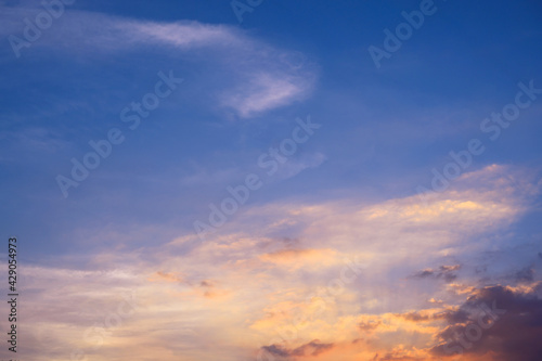 Sunbeams breaking through the clouds with blue and orange sky. Hope  prayer concept for background.