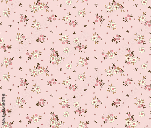Cute seamless vector floral pattern. Endless print made of small white flowers. Summer and spring motifs. Light pink  background. Stock vector illustration.