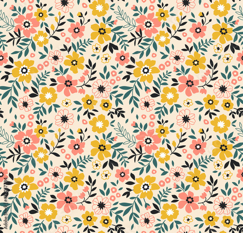 Seamless floral pattern. Ditsy background of small yellow and coral flowers. Small-scale flowers scattered over a ecru background. Stock vector for printing on surfaces and web design.