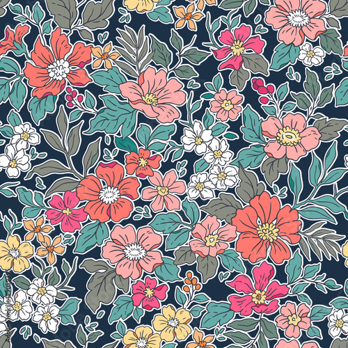 Beautiful vintage floral pattern in small realistic flowers. Small red and coral flowers. Blue background. Liberty style print. Floral seamless background. The elegant the template for fashion prints.