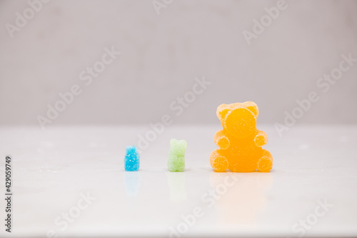 Variety of edible cannabis gummy sizes with varying potencies