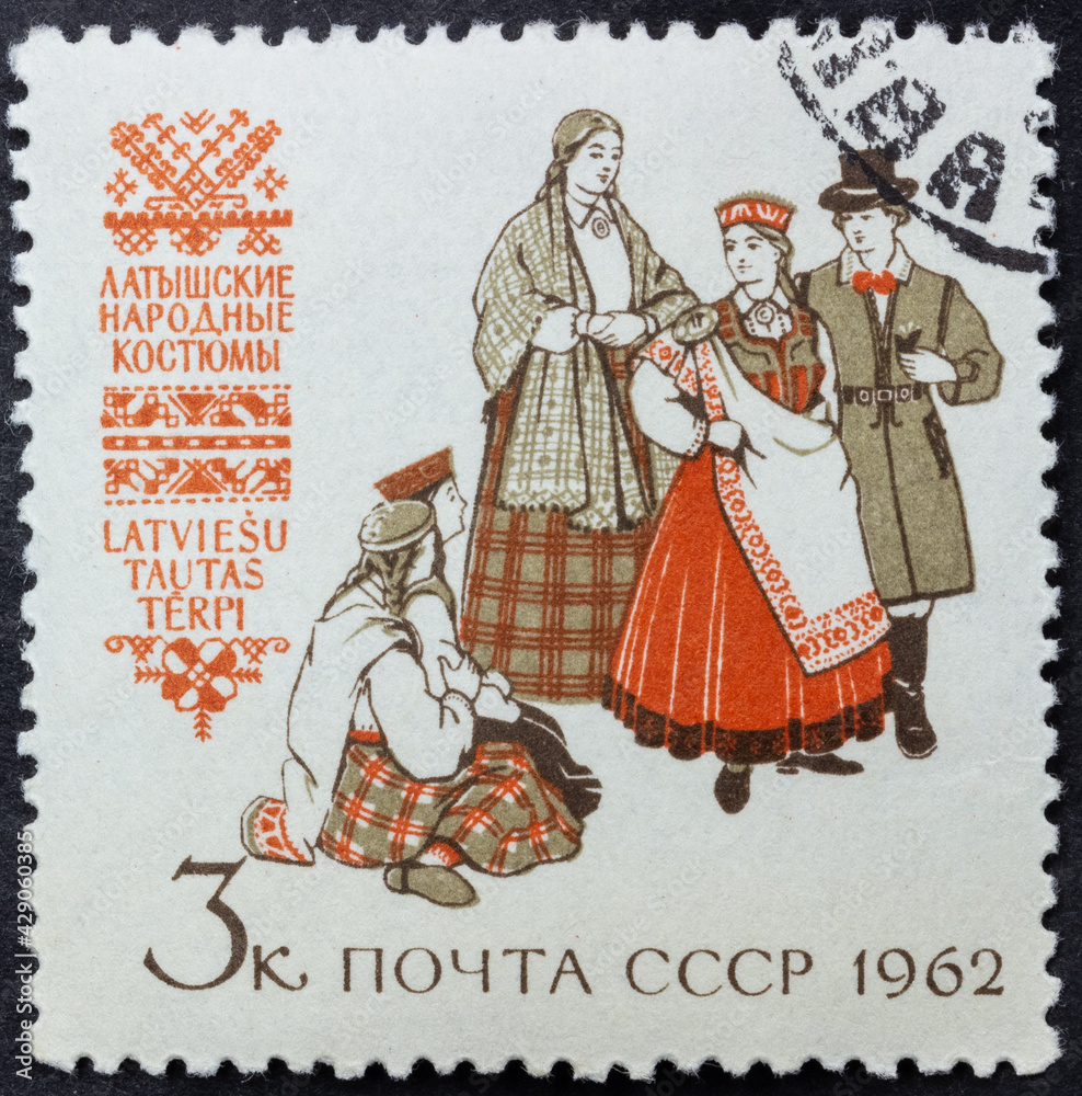 Postage stamp of 'Latvian folk costumes' printed in Republic of USSR. Series 'Costumes of the peoples of the USSR' by artist V. Pimenov, 1962