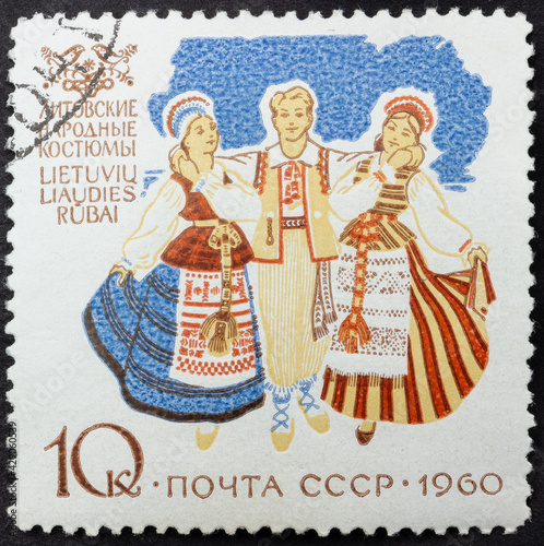 Postage stamp of 'Lithuanian folk costumes' printed in Republic of USSR. Series 'Costumes of the peoples of the USSR' by artist V. Pimenov, 1960