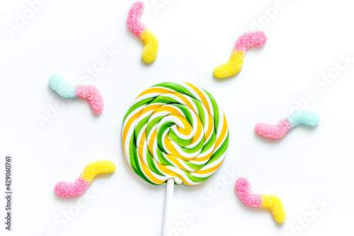 sweets and sugar candies on white background top view mock-up