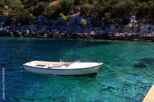 Fototapeta Naklejka Na Ścianę i Meble -  Small boat and beautiful clear sea on island Lastovo, Croatia.