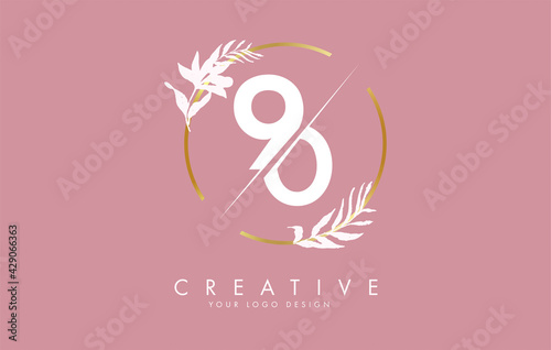 Number 90 9 0 logo design with golden circle and white leaves on branches around.