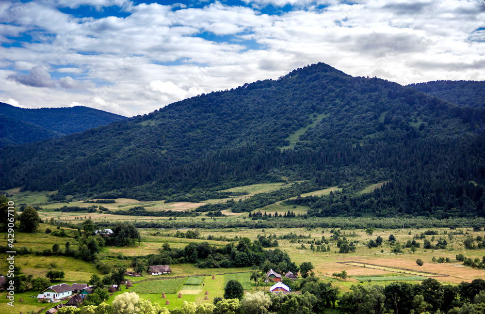a rural landscape at carpathian mountains, national park Skolivski beskidy, Lviv region of Western Ukraine