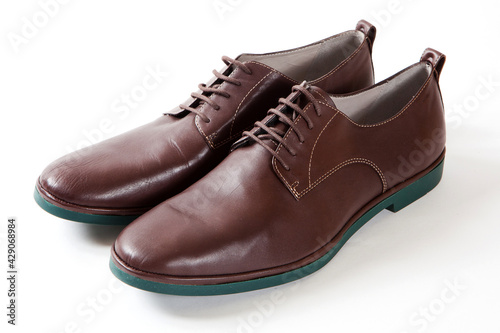 Brown Oxford shoes isolated on white background.