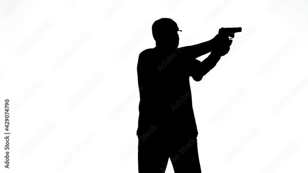 Silhouette of a man in profile shooting a pistol on a white background Silhouette of a man in profile shooting a pistol on a white background