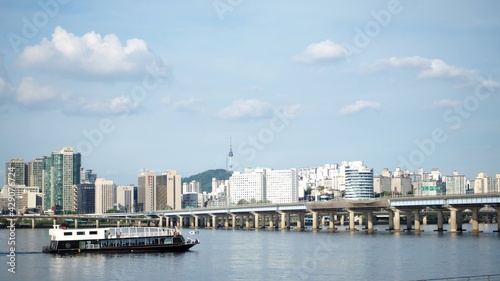 It is a landscape photograph view on the Han River in Seoul  South Korea. A place to relax  Yeouido Park.