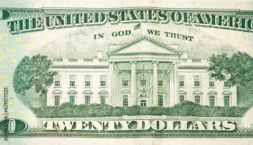 Close-up 20 US dollar banknotes, reverse side twenty dollar banknote depicting white house. Cash exchange currency.