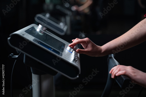 EMS device in gym. Sport training in electrical muscle stimulation suit.